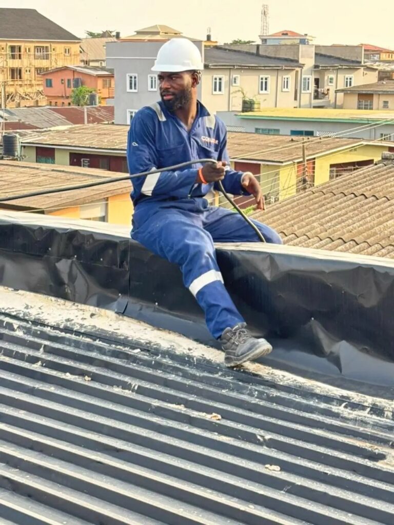 Corustar technician on a rooftop solar installation
